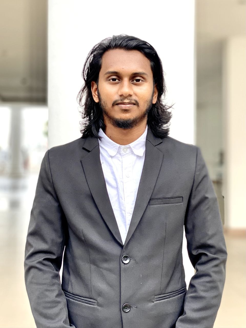 M Nayem in a suit